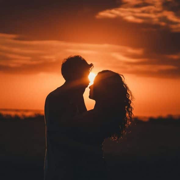 A man and woman at the sunset