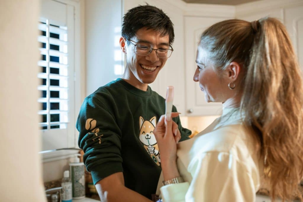 A man and woman happy with the result of pt 