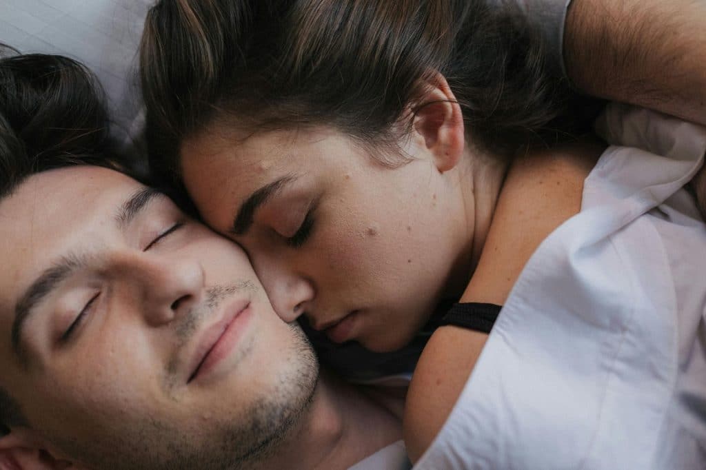 A couple sleeping together
