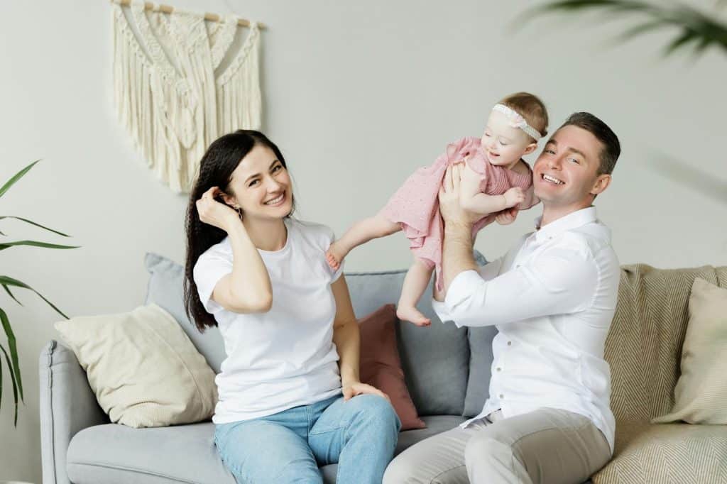A man getting a baby for the woman