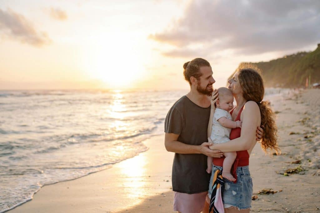 Happy family at the beach 