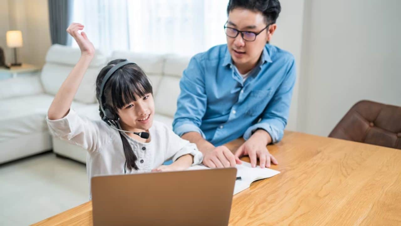 Man struggling to help child with homework at kitchen table.