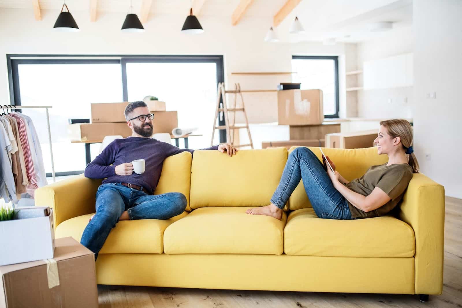 A man and woman at the house.