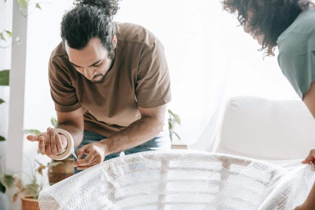 A man helping a woman