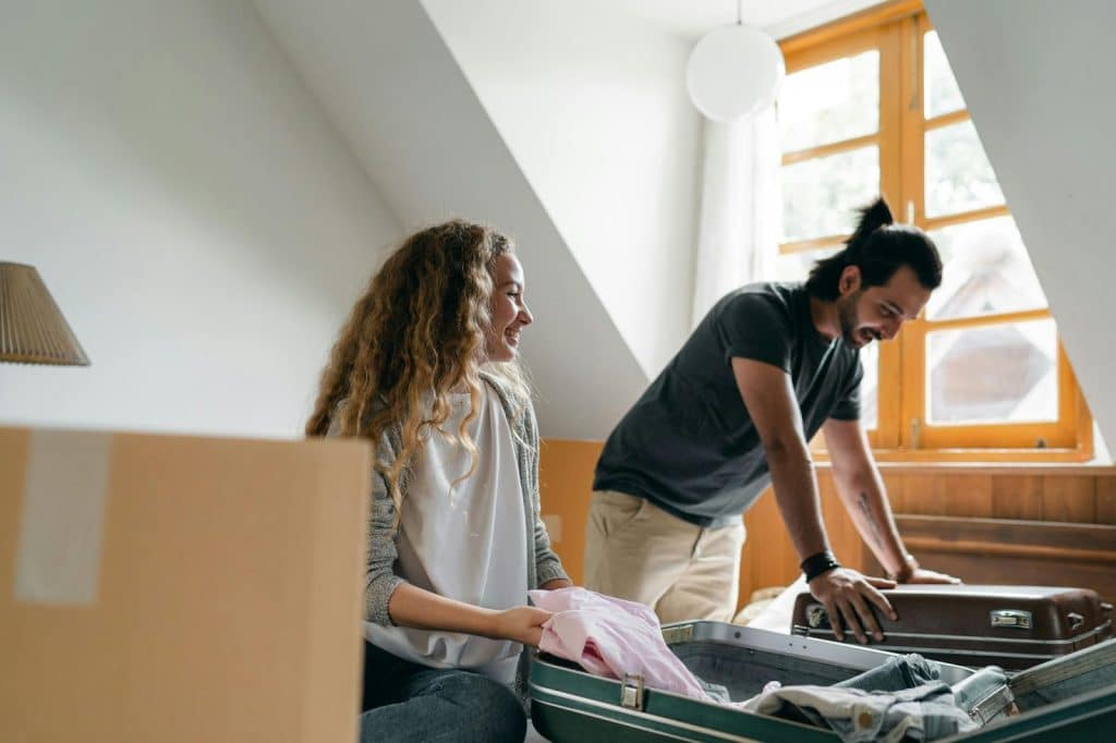 A man and woman cleaning