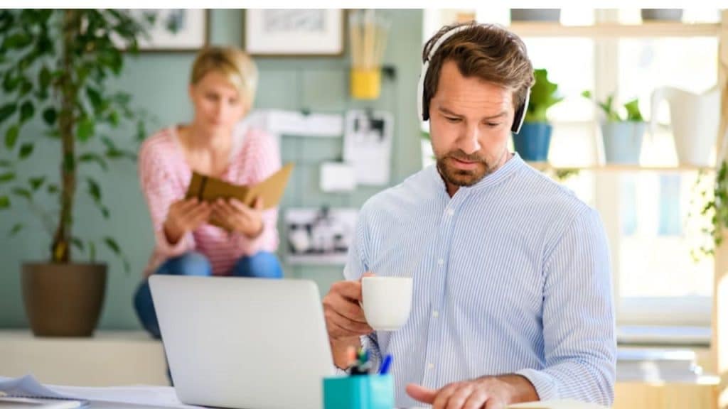 A couple sitting far from each other and with no interaction