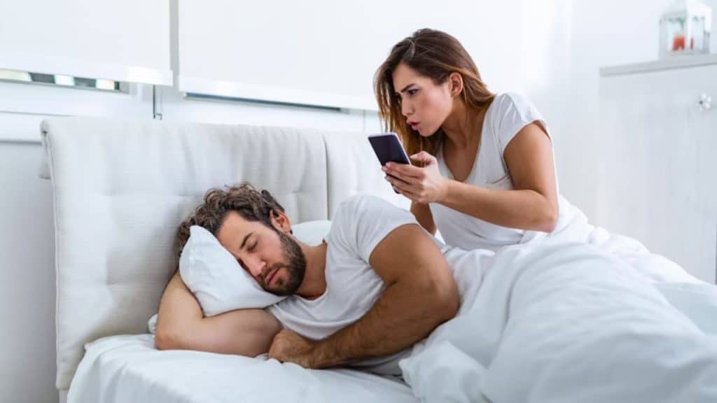 A woman discovering messages on her partner’s phone