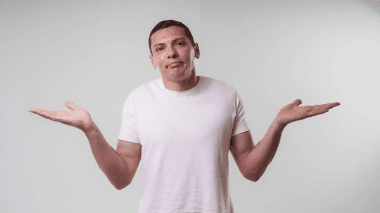 A man shrugging as if to say he doesn’t know.