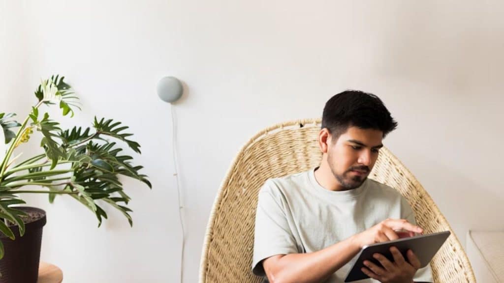 Man sitting in thought, reflecting with a journal