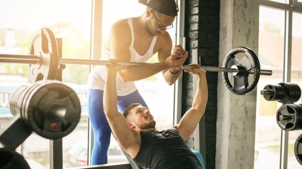 Man lifting weights at the gym