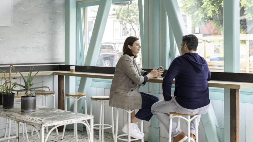 Couple sitting calmly discussing at a table