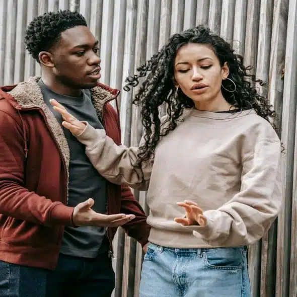 A couple arguing on the street