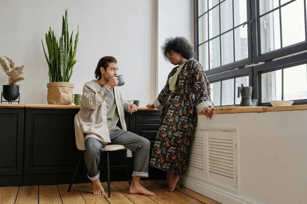 A man and woman talking