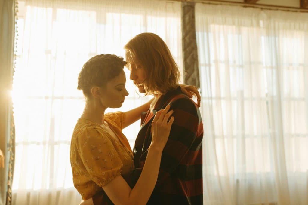 A man and woman having a romantic moment