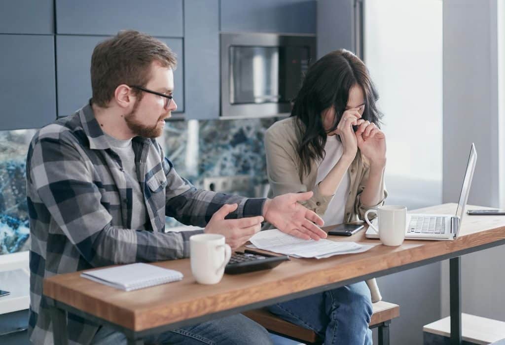 A man explaining to woman