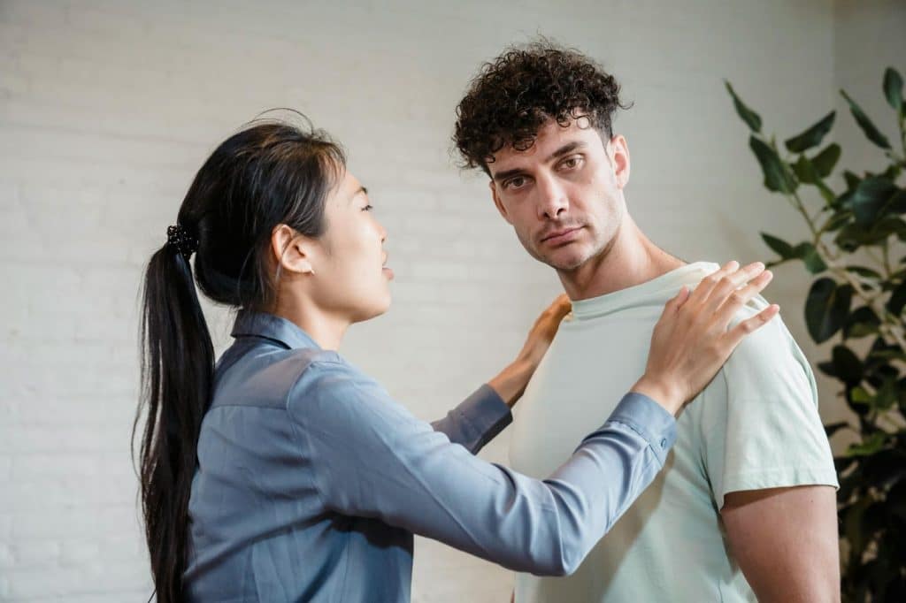 A woman confronting a man