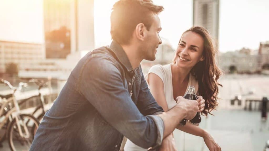 Couple leaning in while having deep conversation