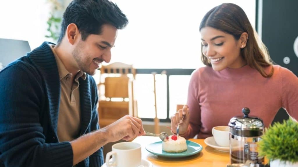 Man surprising woman with her favorite dessert at dinner
