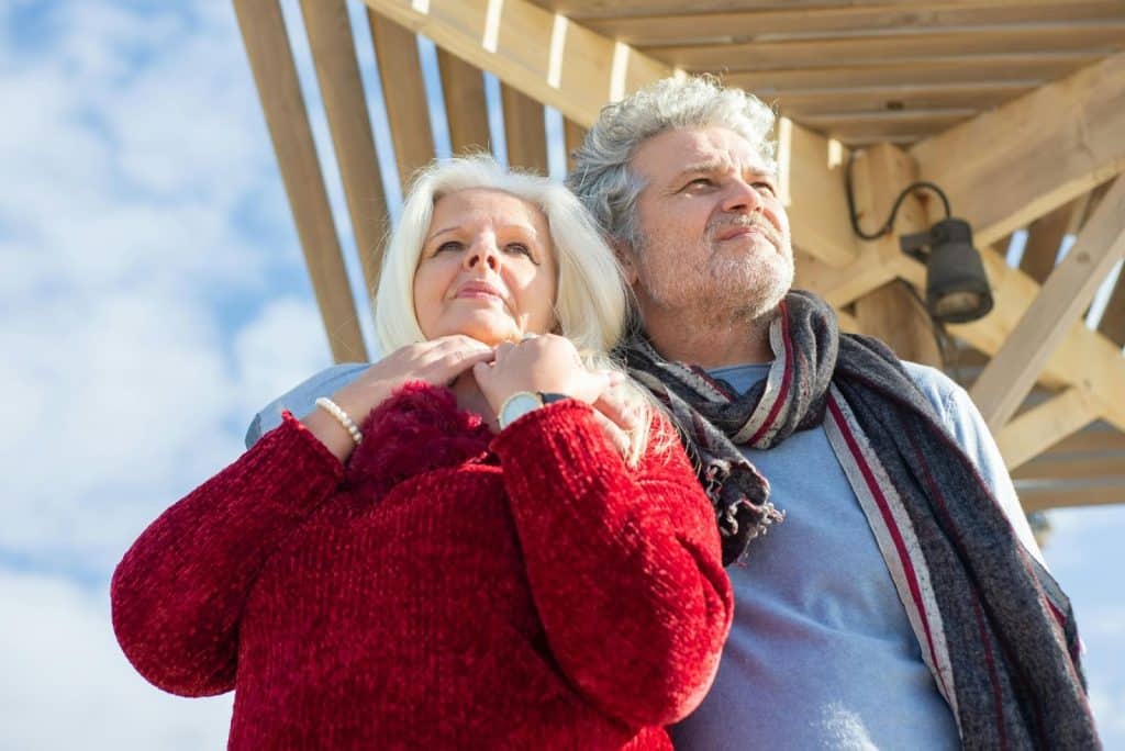 A picture of a man supporting a woman