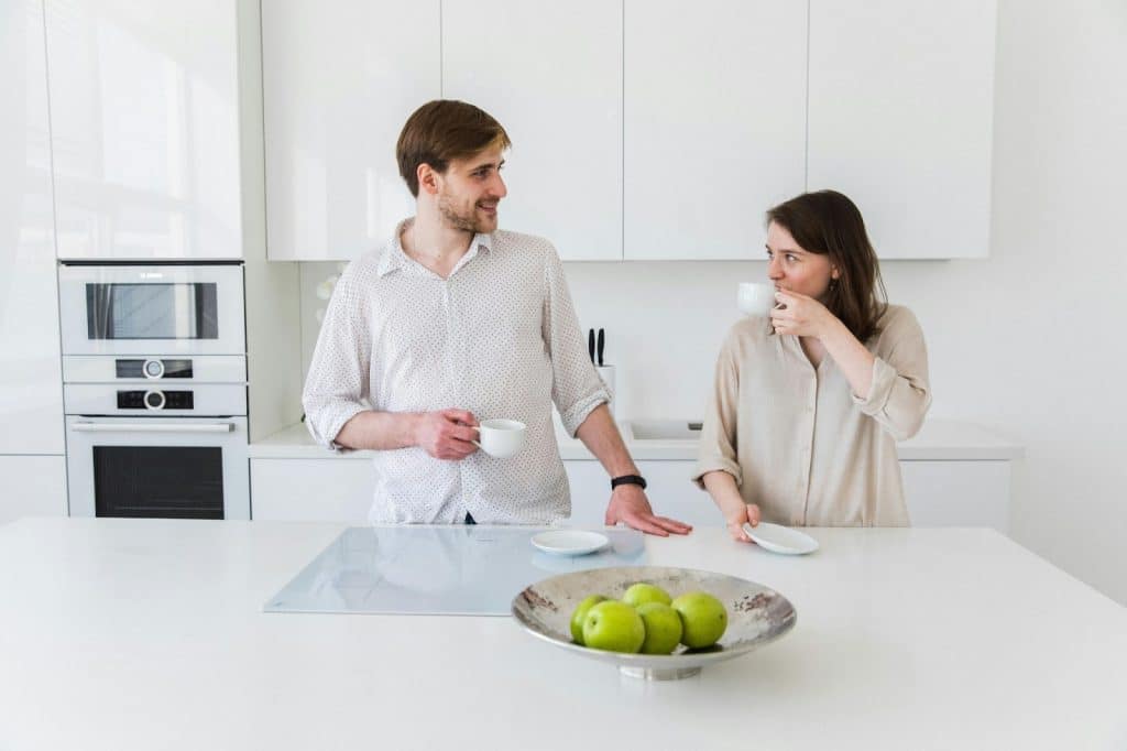 A man and woman looking at each other