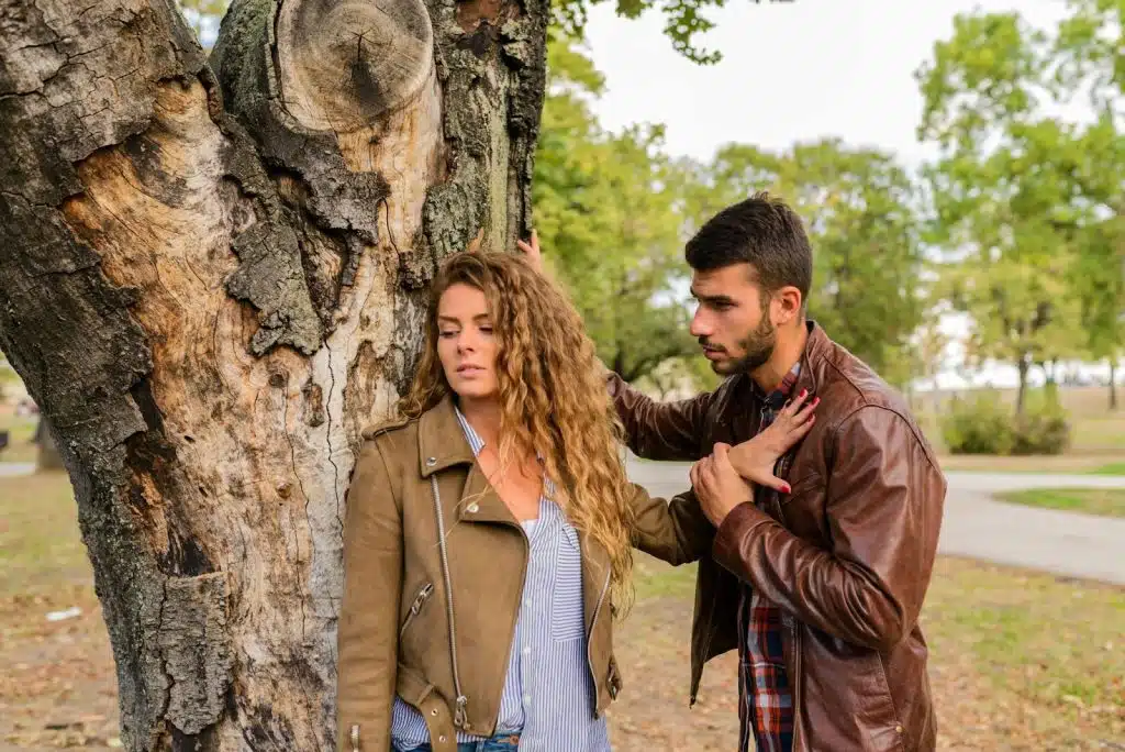 A woman doing silent treatment to a man