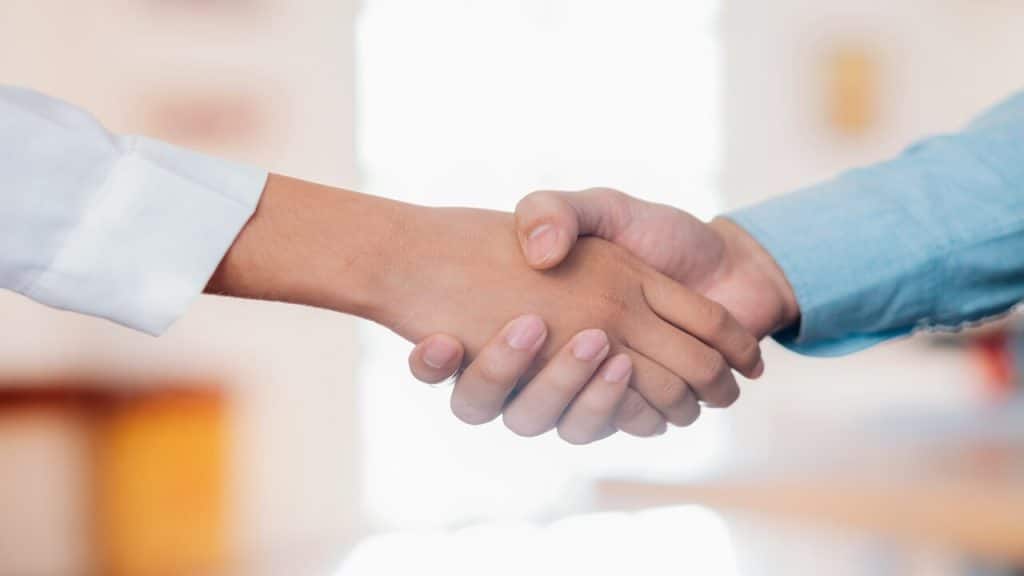 wo people shaking hands