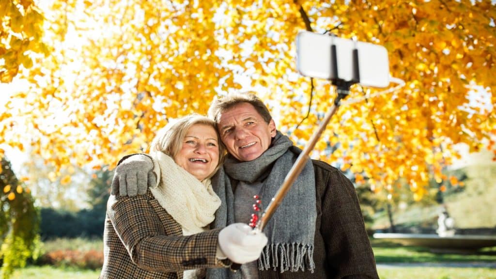 A mature couple taking a selfie