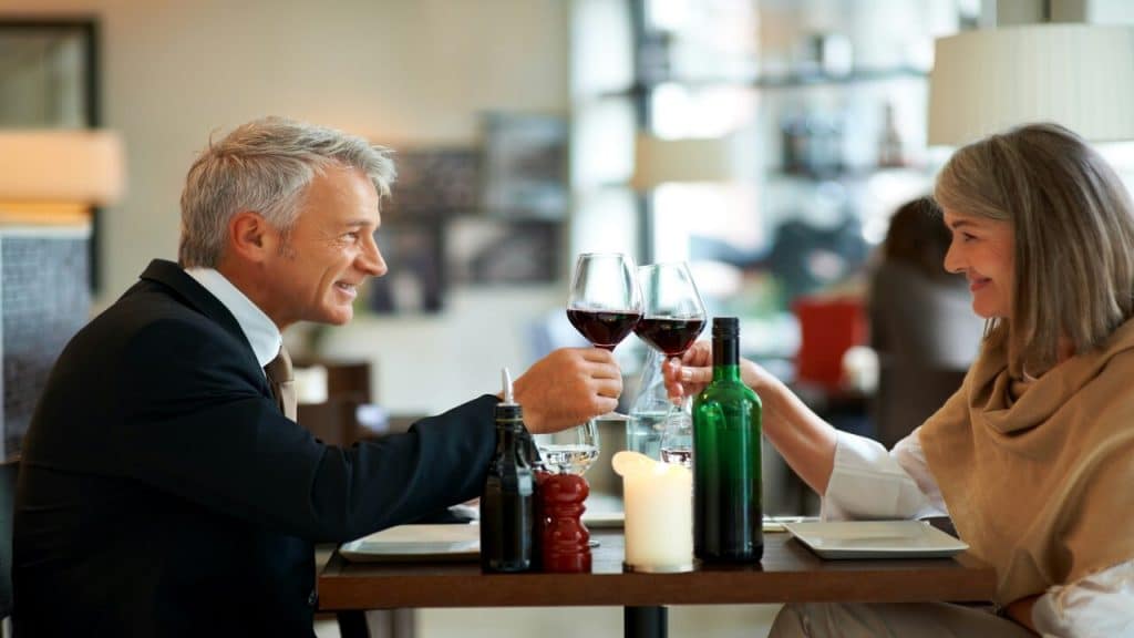 A beautiful mature couple at a fancy restaurant