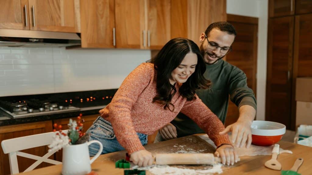 A couple baking together