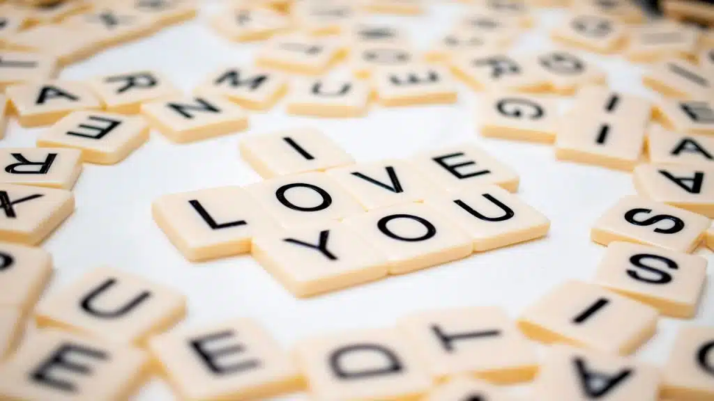 Scrabble blocks spelling out “I love you”