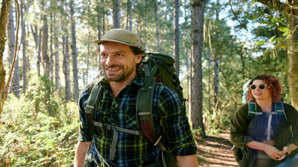 A couple hiking in the woods