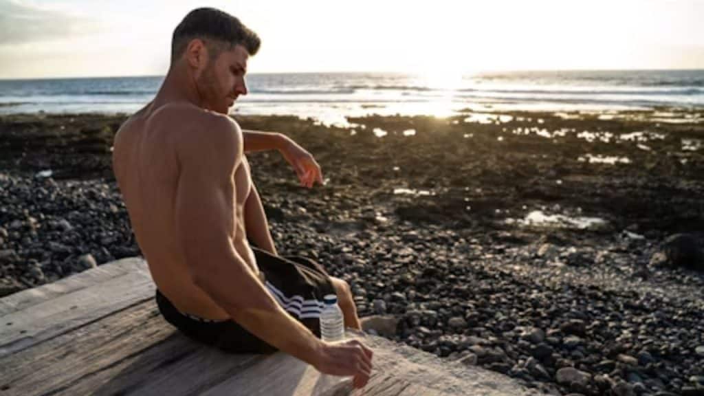 Man practicing deep breathing outdoors in nature