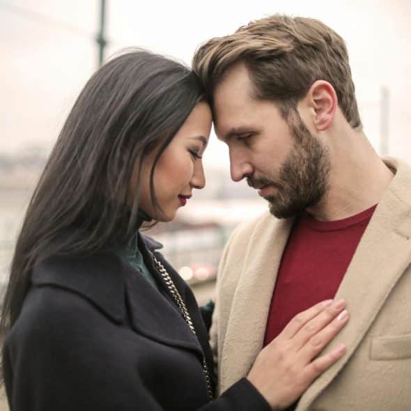 A man and woman close to each other