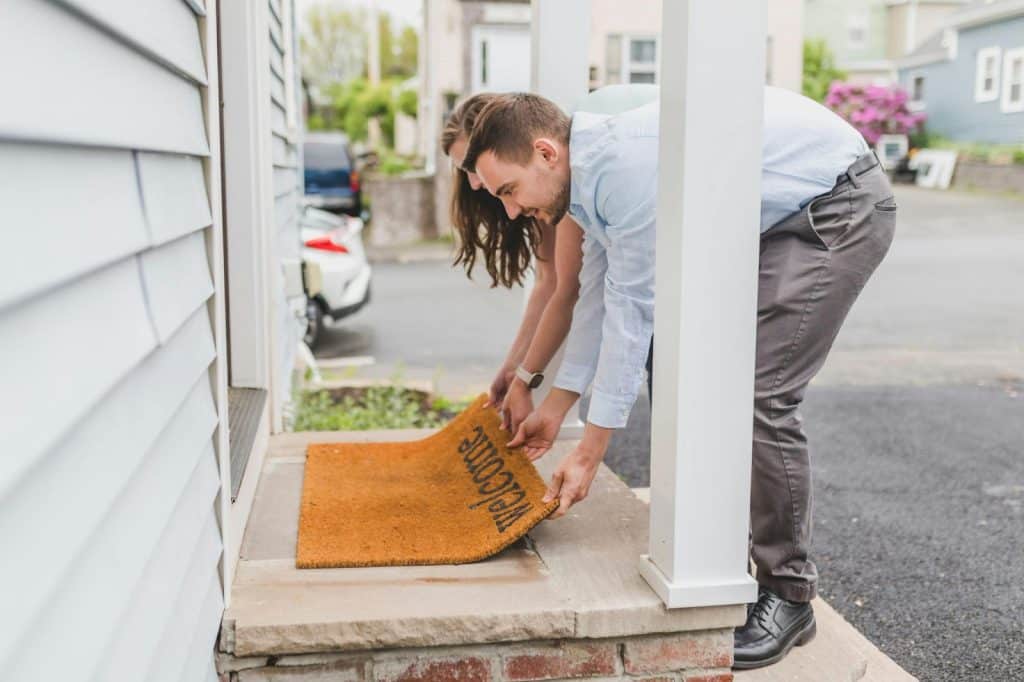 A man helping a woman