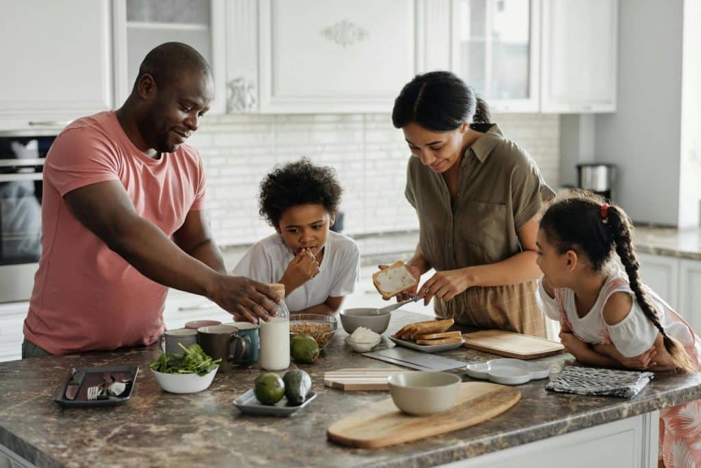 A man and woman having a bonding with children