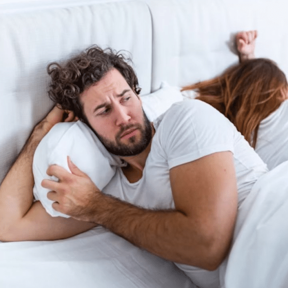 Man avoiding eye contact with his wife making his partner invincible