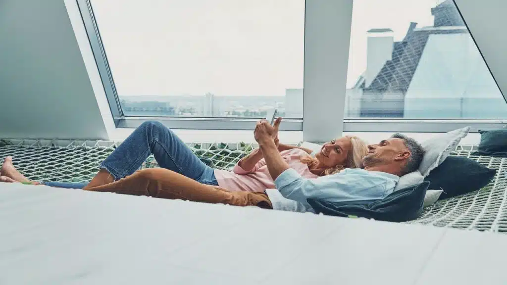 A couple relaxing on the hammock