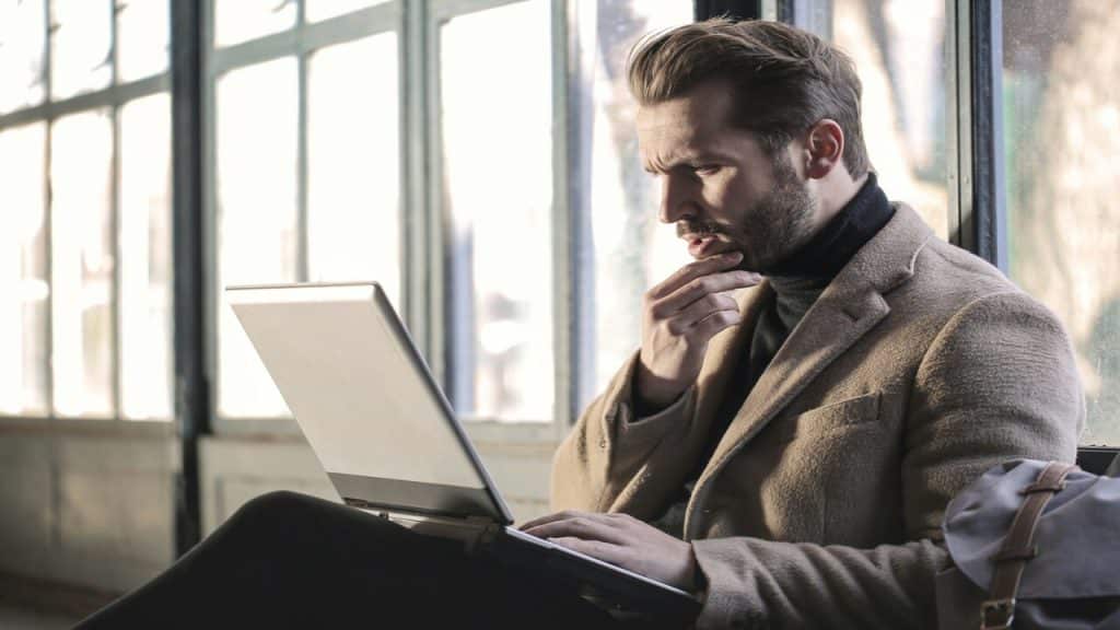A businessman deep in thought