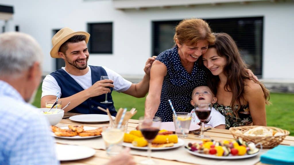 A family having lunch outdoors.