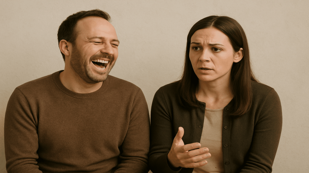 A man laughs while his wife talks about something important