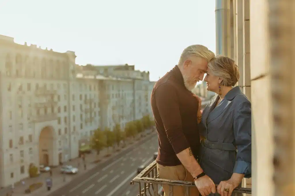 A man and woman at the balcony