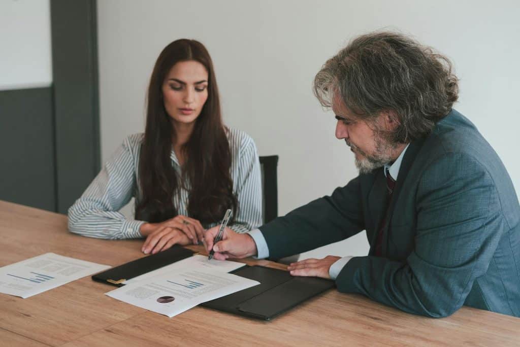 A man and woman talking about their finance