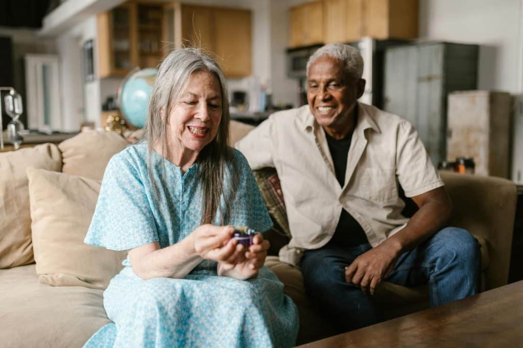 A man and woman looking at something