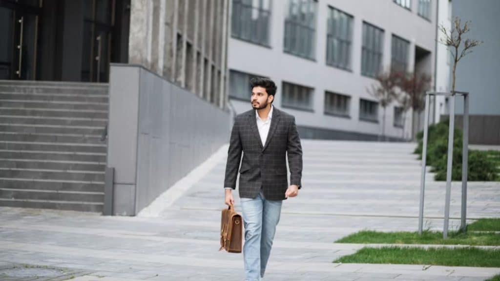 Man looking somber leaving a courthouse