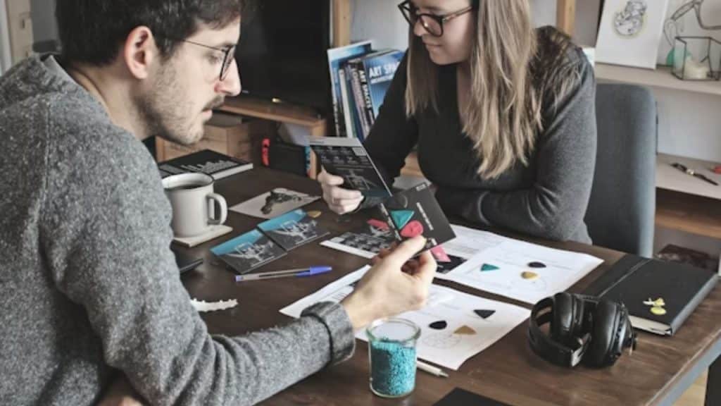 Man and woman looking frustrated while planning