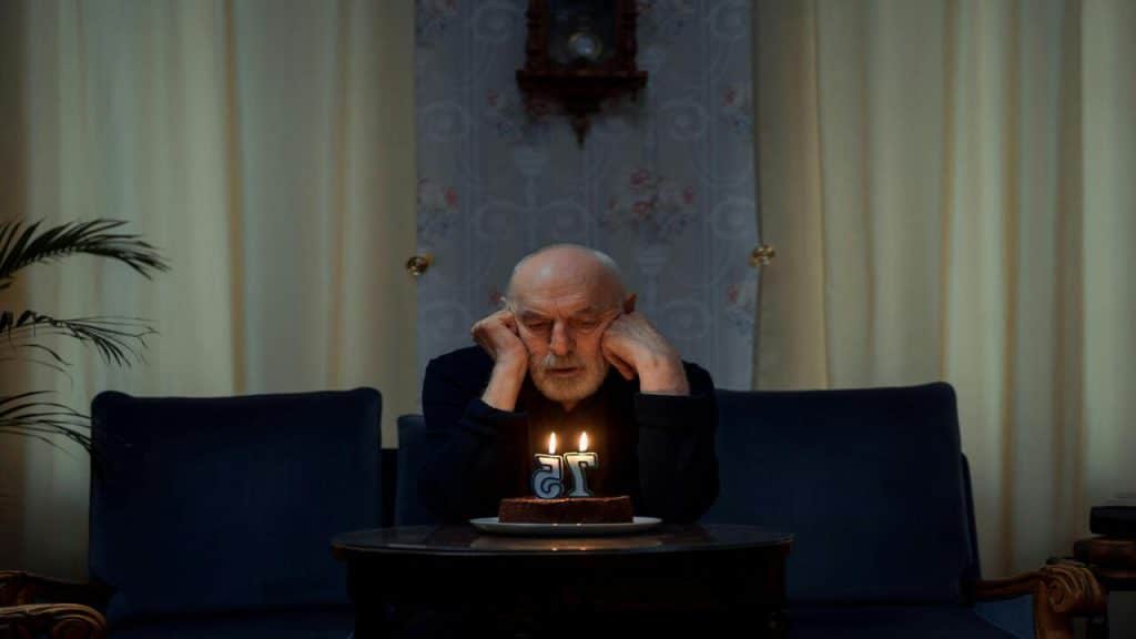 A man celebrating his birthday alone