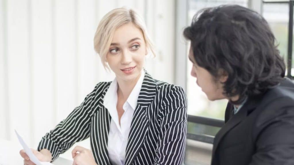Woman looking self conscious after a comment