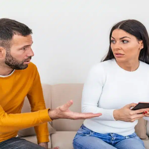 A man confronting his girlfriend