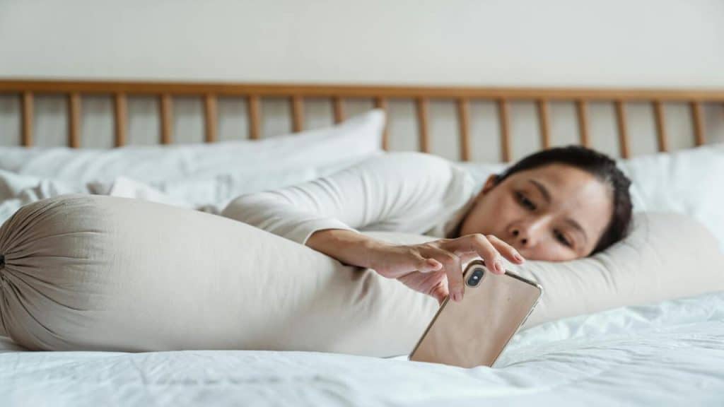 A woman laying in bed
