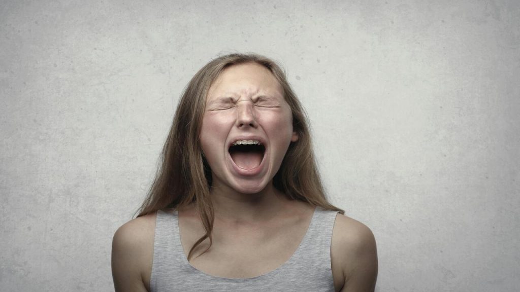 A woman yelling